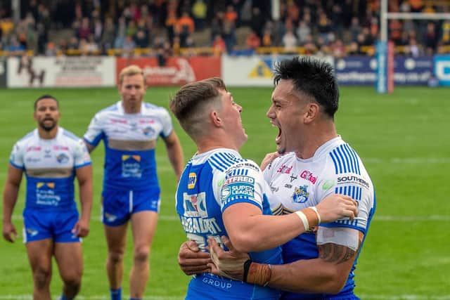 Jack Broadbent: Celebrating scoring the Rhinos second try atCastleford but now the Leeds players are sidelined by Covid.  Pictures: Bruce Rollinson