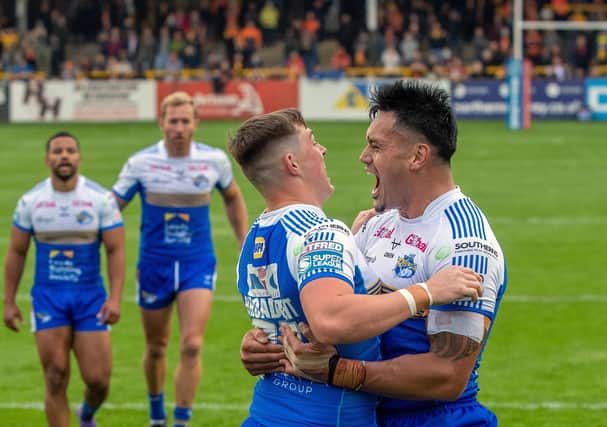 Jack Broadbent: Celebrating scoring the Rhinos second try at
Castleford but now the Leeds players are sidelined by Covid.  Pictures: Bruce Rollinson