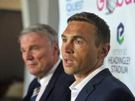 Kevin Sinfield, right, with Rhinos chief executive Gary Hetherington. Picture by Tony Johnson.