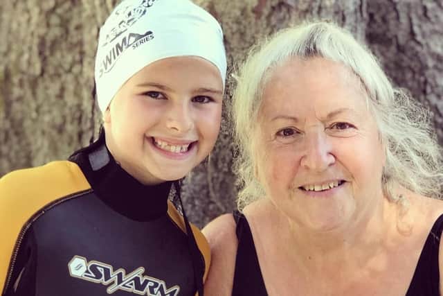 Inspirational Isla Beck (left) with her grandmother Jan Van Loo. The pair are keen open water swimmers who recently completed the Great North Swim. Photo credit: Submitted picture