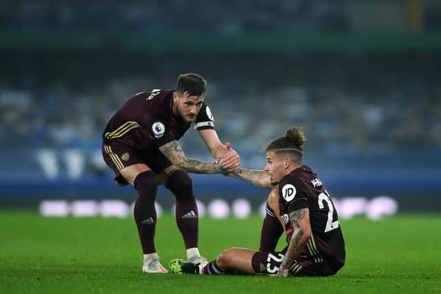 Leeds United's Liam Cooper and Kalvin Phillips could face off when England and Scotland meet. Pic: Getty