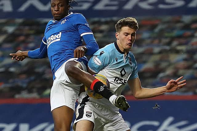 LEEDS RADAR - Joe Aribo of Rangers tangles with Leo Hjelde, who was on loan to Ross County from Celtic last season and is one of the youngsters Leeds United are monitoring ahead of their summer Under 23s recruitment. Pic: Getty