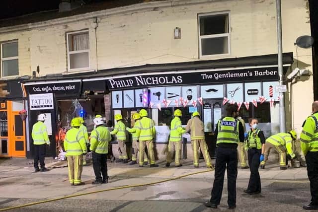 The Pudsey community has rallied to raise £1,250 in just hours to help the owners of a parade of shops destroyed in a horrific overnight incident - as a vehicle careered through the window.