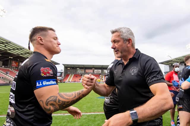 Castleford Tigers' Tyla Hepi is congratulated by Daryl Powell after helping them beat Warrington Wolves in the Challenge Cup semi-final. (Allan McKenzie/SWpix.com)
