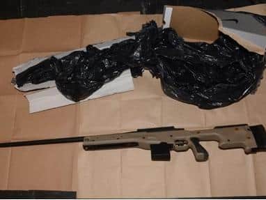 A Glock semi-automatic pistol and a Howa bolt-action rifle were found in Shepherd's home (Photo: NCA)
