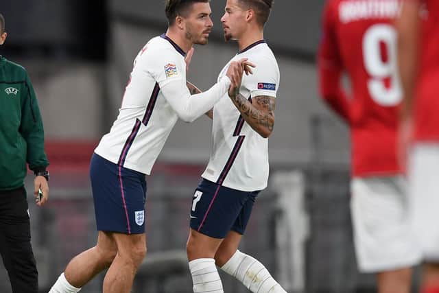 Leeds United's Kalvin Phillips and Jack Grealish in action for England. Pic: Getty
