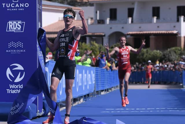 TOP DOG: Jonny Brownlee celebrates as he crosses the finish line at the World Triathlon Cup in Arzachena Emanuele Perrone/Getty Images)