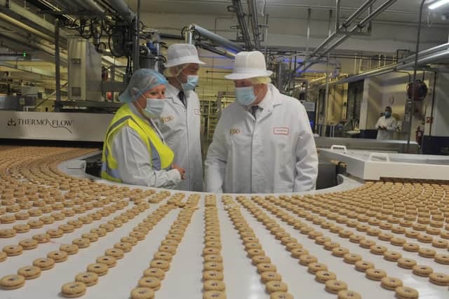Prime Minister Boris Johnson visits the Fox's Biscuits factory in Batley with Ryan Stephenson, the Conservative candidate in the upcoming Batley and Spen by-election. Photo by Mike Simmonds