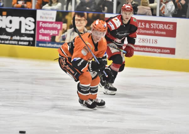 Ross Kennedy chases down the puck during a game between Telford Tigers and Swindon Wildcats in 2019-20. Picture courtesy of Steve Brodie.
