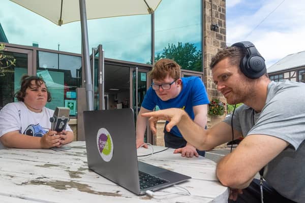 West SILC Power House, based at Springfield Mills,  Farsley. Pictured is student Katie Flanagan, 17, and George Stubbs, 18, with teacher James Paylor, during an outdoor radio lesson.