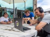 West SILC Power House, based at Springfield Mills,  Farsley. Pictured is student Katie Flanagan, 17, and George Stubbs, 18, with teacher James Paylor, during an outdoor radio lesson.