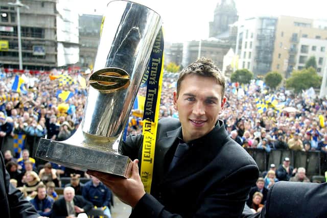 Leeds Rhinos captain Kevin Sinfield holds the Super League trophy during a civic reception at the Millennium Square in Leeds, Sunday October 17, 2004. Leeds Rhinos won the Super League Grand Final against Bradford Bulls yesterday after defeating them 16-8 at Old Trafford. (Picture: Gareth Copley/PA)