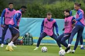 WAITING GAME: England’s Mason Mount, third left, and England’s Ben Chilwell, fourth left, during a team training session yesterday. Picture: AP/Frank Augstein.
