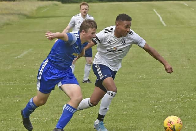 Yorkshire Amateur League Division 1: Nathan Hunt, of Leeds City Res, is first to the ball against Horsforth St Margarets III. Picture: Steve Riding.