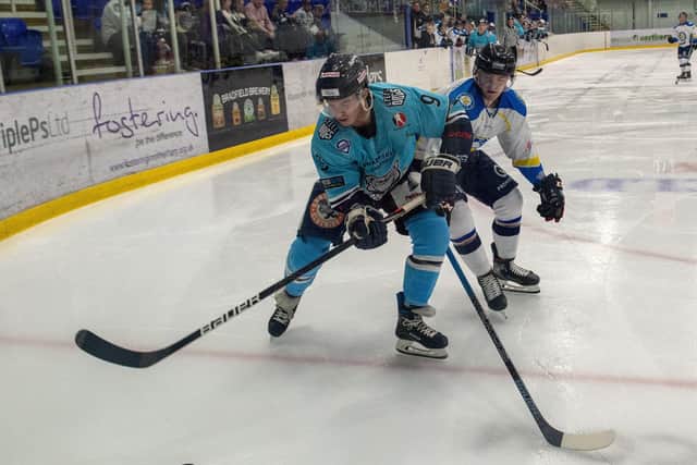 BATTLE AND COMPETE: Adam Barnes, right, jostles for possession against Sheffield Steeldogs' Thomas Barry. Picture: Bruce Rollinson