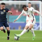 SIDELINED: Scotland's Billy Gilmour (left) and Mason Mount battle for the ball at Wembley on Friday night. Picture: Nick Potts/PA