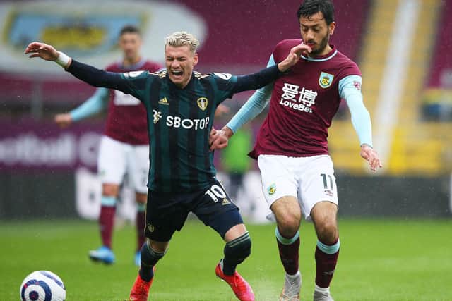 FLASH POINT- Dwight McNeil was unhappy with Gjanni Alioski's reaction to a challenge during Leeds United's win at Burnley, before the Whites defender responded with a playground gesture. Pic: Getty
