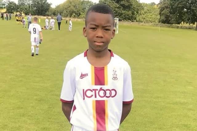 Pictured, Tomi Solomon, 13, a talented footballler who played for the academy at Bradford City. Sadly the teenager died earlier this month. Photo credit: Submitted photo