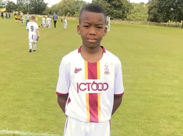 Pictured, Tomi Solomon, 13, a talented footballler who played for the academy at Bradford City. Sadly the teenager died earlier this month. Photo credit: Submitted photo