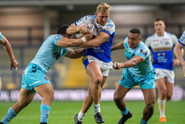 Matt Prior is tackled by Wakefield's Reece Lyne. Both are set to feature in Friday's international, on opposite sides. Picture by Bruce Rollinson.