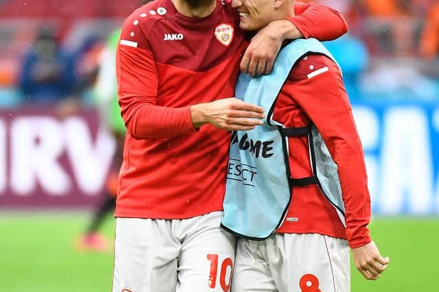 TRIBUTE: From Leeds United's Gjanni Alioski, right, to outgoing North Macedonia team mate and all time record goalscorer Goran Pandev, left. Photo by Piroshka van de Wouw - Pool/Getty Images.