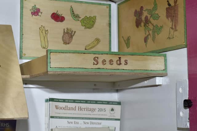Boxes for seeds and leaflets in the Little Veg Library at Chapel Allerton.