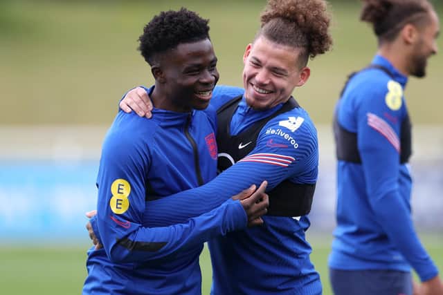BOTH IN: Gary Neville believes Arsenal's Bukayo Saka, left, and Leeds United's Kalvin Phillips, right, should both start for England against Germany. Photo by Catherine Ivill/Getty Images.