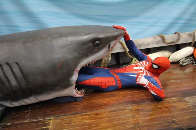 The jaws photo opportunity. Pictured is Spiderman being eaten by Jaws.