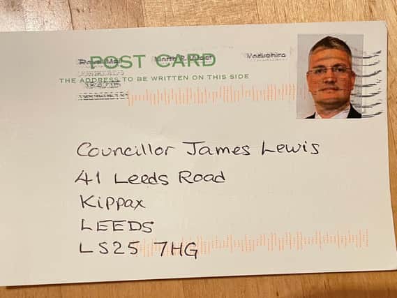 The Leader of Leeds City Council received a postcard from a constituent with his face used as a stamp. Photo: James Lewis.