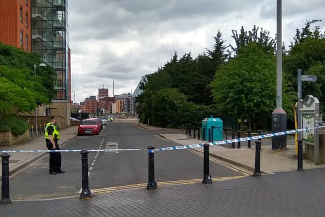 Police have cordoned off Crown Point Road in Leeds this afternoon as roads and footpaths in the area were also closed.