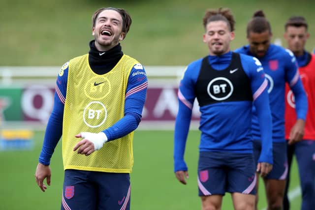 LAUGHING GAME: England's Jack Grealish during a training session at St George's Park. Picture: Nick Potts/PA