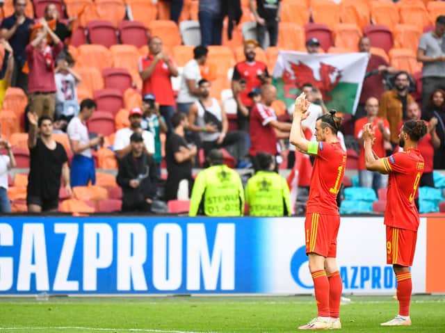 BACK STRONGER - Leeds United man Tyler Roberts, pictured applauding the travelling fans along with Wales team-mate Gareth Bale, insists Rob Page's team can leave Euro 2020 proud of their achievements. Pic: Getty