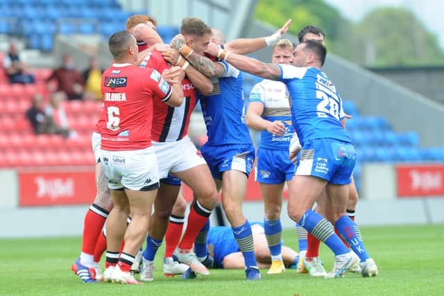 Tempers flared during Sunday's Super League encounter between Salford Red Devils and Leeds Rhinos resulting in a flurry of red and yellow cards. Picture: Steve Riding.
