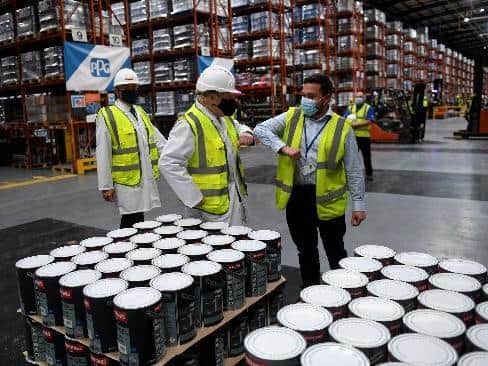 Prime Minister Boris Johnson pictured during his visit to PPG Architectural Coatings, Huddersfield Road, Birstall, West Yorkshire....Picture by Simon Hulme/Yorkshire Post..28th June 2021..