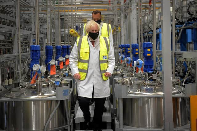 Prime Minister Boris Johnson pictured during his visit to PPG Architectural Coatings, Huddersfield Road, Birstall, West Yorkshire...Picture by Simon Hulme/Yorkshire Post..28th June 2021..