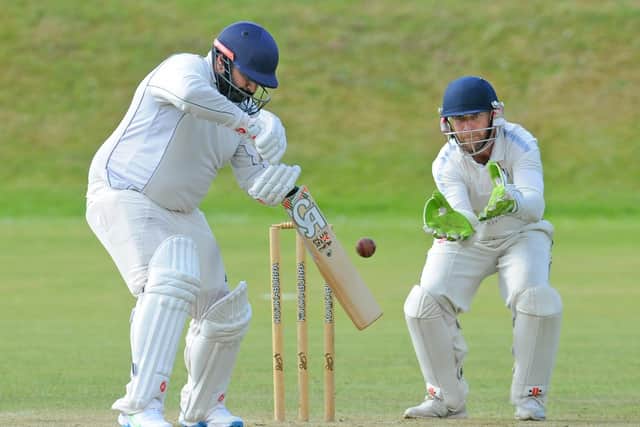 Shayan Siddiqui of Old Leos looks to guide the ball away against Calverley St Wilfrids. Picture: Steve Riding.