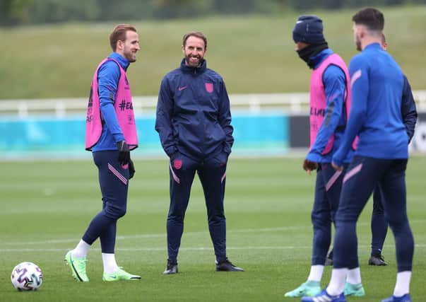 LOOK FORWARD, NOT BACK: England coach Gareth Southgate, talks to Harry Kane during the England training Session at St George's Park. Picture: Catherine Ivill/Getty Images