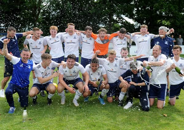 Leeds City Reserves uncork the champagne after beating Beeston St Anthony 6-0 to secure the Division 1 title - by a single point. Picture: Steve Riding.