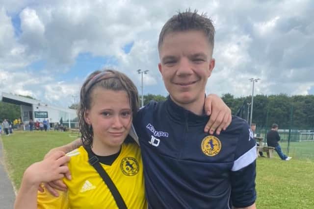 John Dunwell is a coach for Under 13s girls football team Horsforth St Margaret's Wildcats, who recently won the Harrogate and District U13 division two title.
John is pictured with his  13-year-old sister Faye, who  plays for the Wildcats.