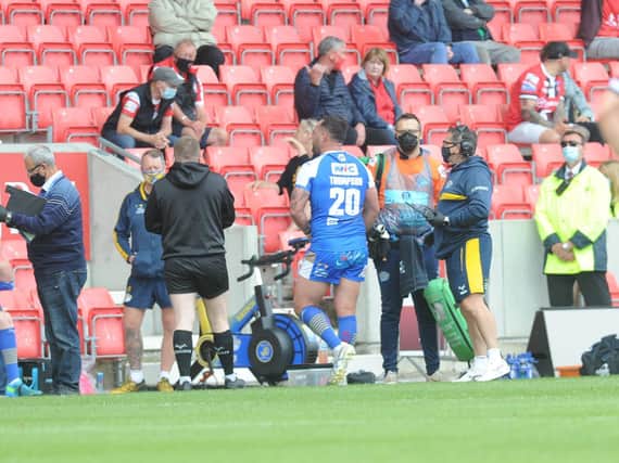 Rhinos' Bodene Thompson heads towards the changing rooms after being sent-off against Salford. Picture by Steve Riding.