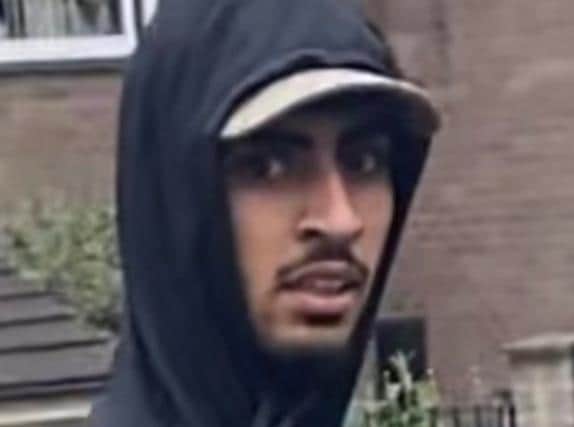 Police have issued a picture of man they want to speak to in connection with a number of assaults on Labour activists who are alleged to have been pelted with eggs and kicked in the head while on the campaign trail in Batley and Spen.