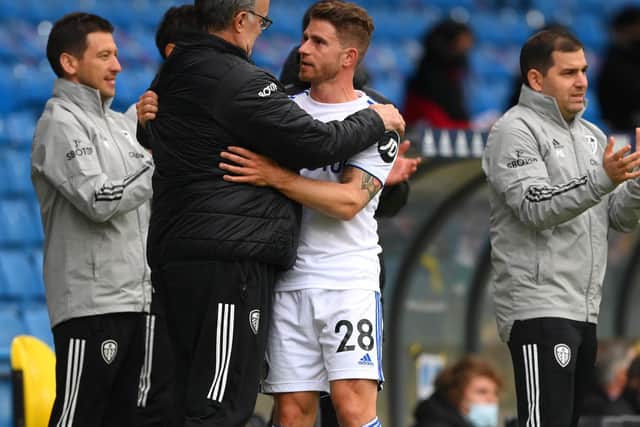 Former Leeds United defender Gaetano Berardi embraces Marcelo Bielsa. Pic: Getty