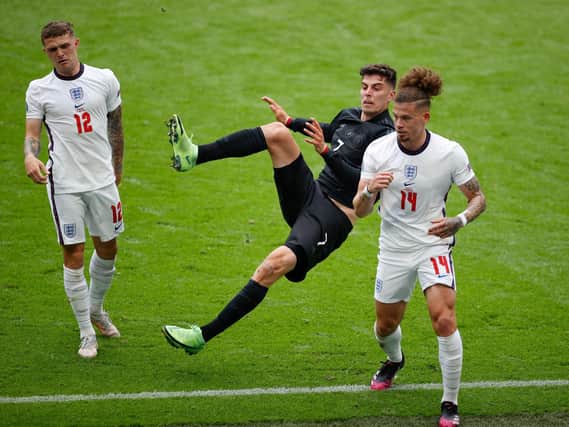 CRUNCH TIME - Kalvin Phillips of Leeds United twice left Chelsea and Germany star Kai Havertz on the deck with crunching challenges during England's 2-0 win at Wembley. Pic: Getty