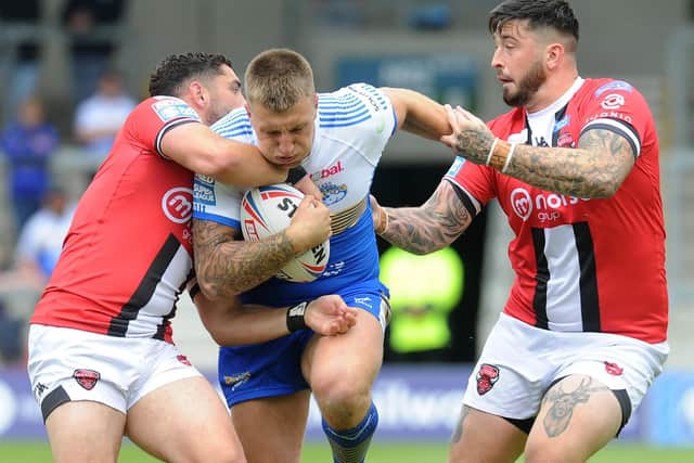 Leeds Rhinos' Alex Mellor on the charge against Salford Red Devils on Sunday. The forward was handed a one-game ban for making physical contact with the referee. Picture: Steve Riding.