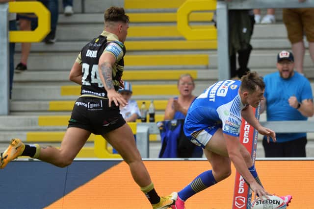 First up: Rookie Leeds winger Jack Broadbent scores his first try.
Picture: Jonathan Gawthorpe