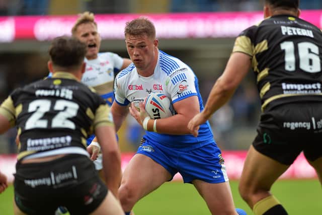 Impressive: Young forward Tom Holroyd looks for a way through Leigh's defence.

Picture: Jonathan Gawthorpe