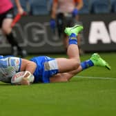 James Donaldson touches down for Leeds' first try against Leigh. Picture by Jonathan Gawthorpe.