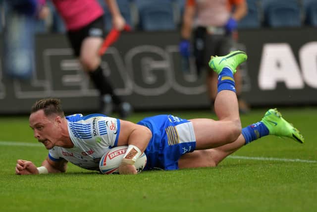 James Donaldson touches down for Leeds' first try against Leigh. Picture by Jonathan Gawthorpe.