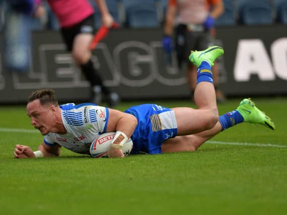 James Donaldson touches down for Leeds' first try against Leigh. Picture by Jonathan Gawthorpe.