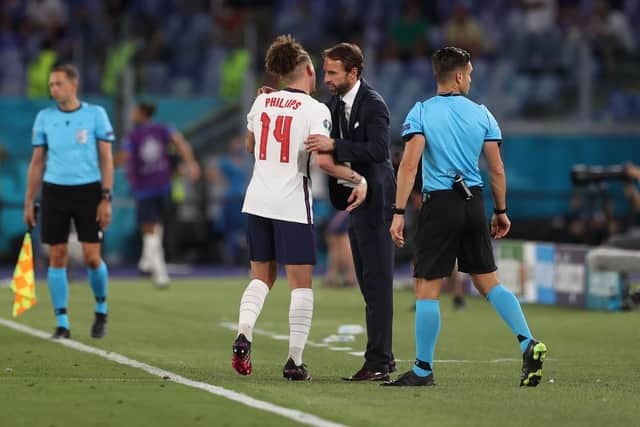 Leeds United's Kalvin Phillips is greeted by England manager Gareth Southgate. Pic: Getty